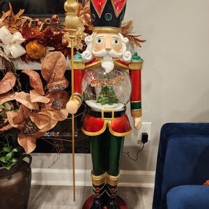 Festive Nutcracker with Snow Globe - Red, Green, Gold